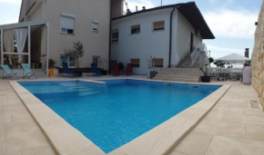 Apartments with a swimming pool Novi Vinodolski - 2419